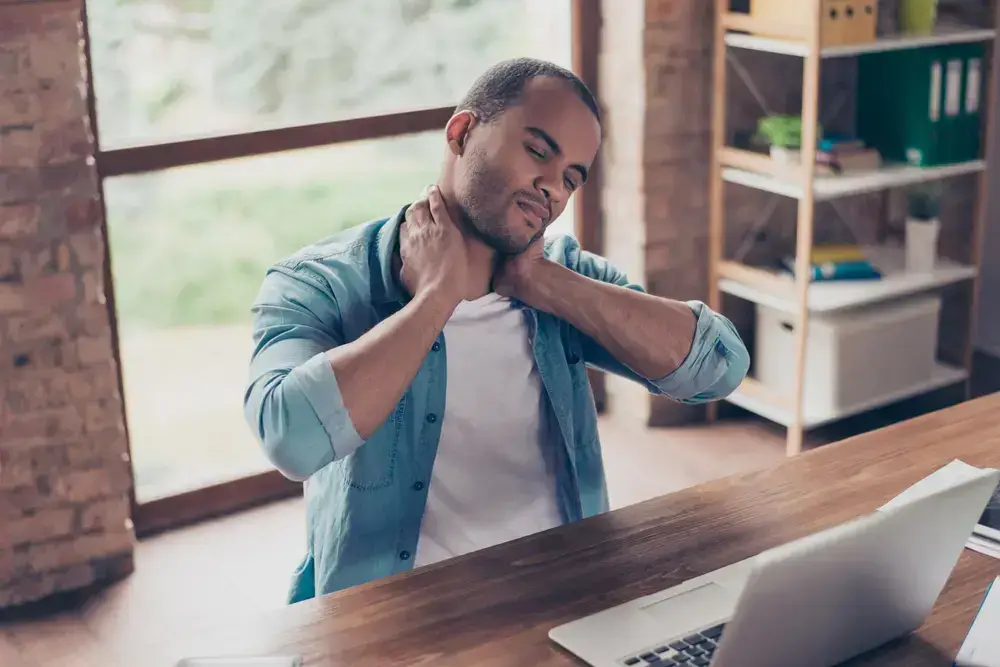 Man-having-neck-pain